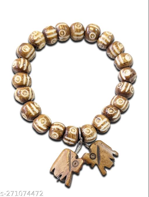 Tribal bracelet with wooden beads for peace and positivity.