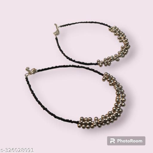 silver and black anklets