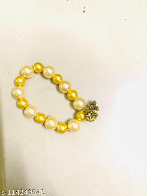 Abhinandan Creation stretchable bracelet with golden silver pearl for women / girls