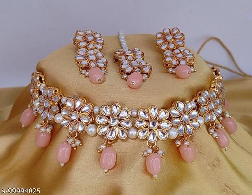Kundan-Necklace-set-with-Maangtikka---Pink-Jewellery-Set