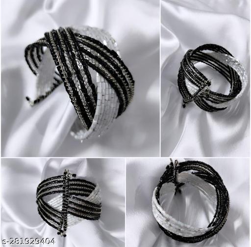Wide black beaded cuff bracelet with silver bead strips. Statement big bracelet. High fashion jewelry. Elegant bead embroidered accessory.