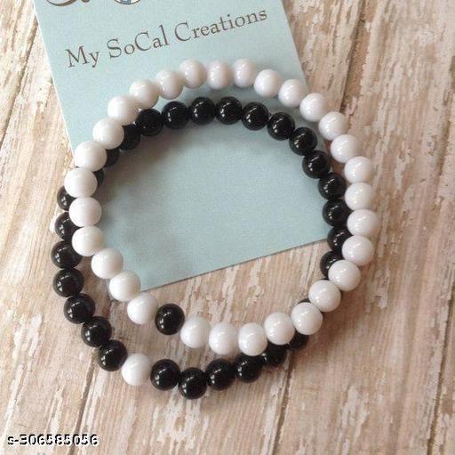 Trending black couple bracelet for man and boys for partywear and regular