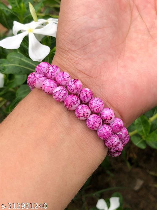 STAY ON TREND WITH A PLAYFUL PINK BEADED BRACELET THIS SUMMER