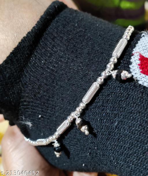 Silver anklets with black stones and beads