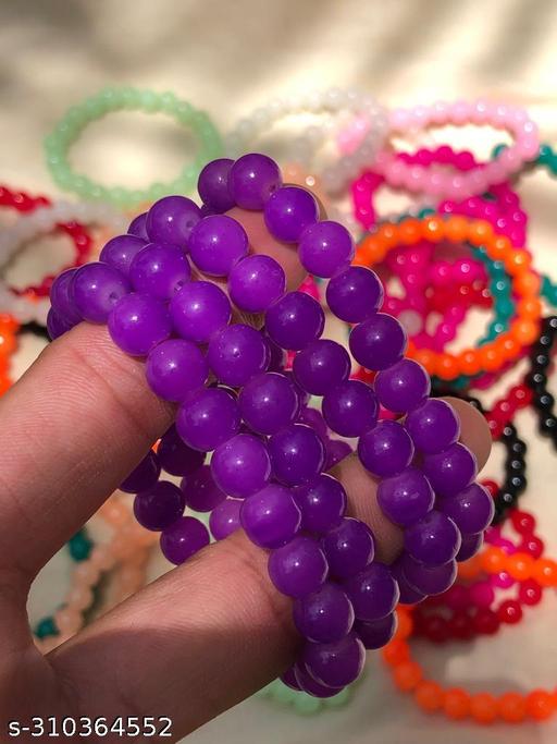 ADD A TOUCH OF ROYALTY TO YOUR LOOK WITH THIS PURPLE BEADED BRACELET